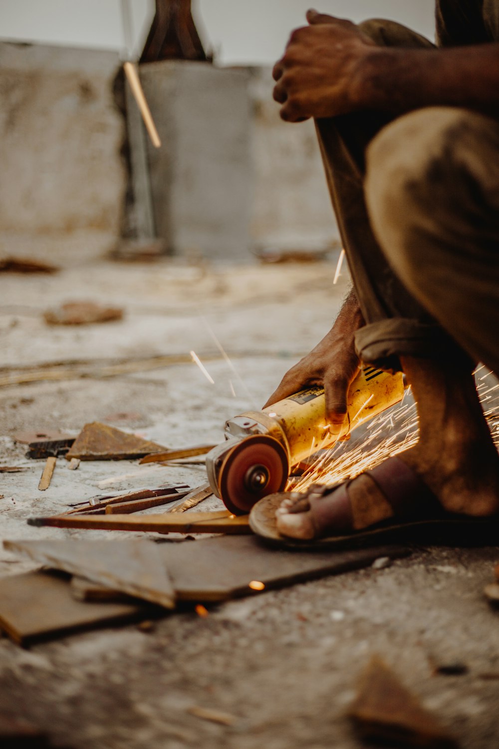 man holding angle grinder