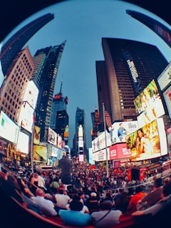 Wide-angle capture of Vibo Place complex bustling with activity during peak hours