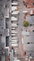 aerial view of trucks on gray commercial building during daytime