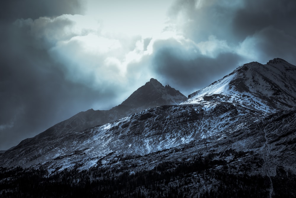 landmark photography of mountain during cloudy sky