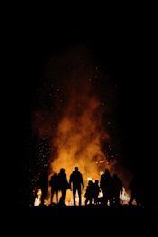 bonfire surrounded by people