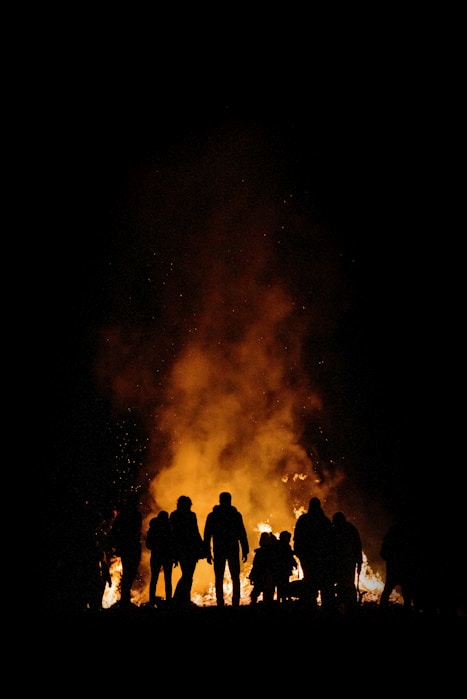bonfire surrounded by people