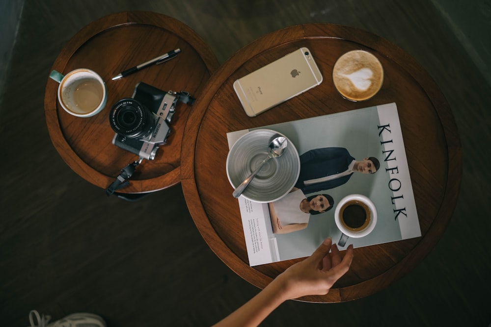 person holding white ceramic mug