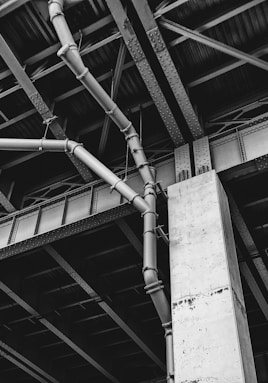 grayscale photo of building post