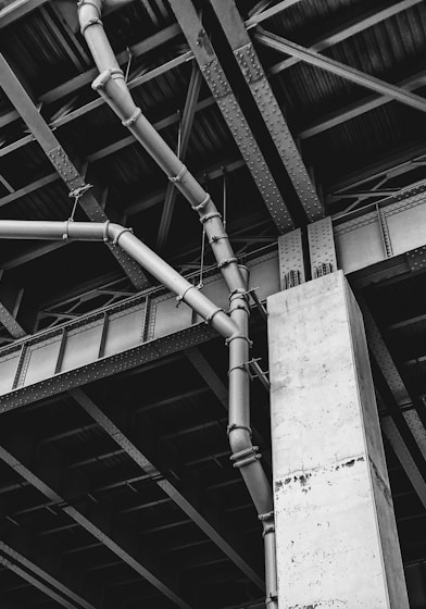 grayscale photo of building post