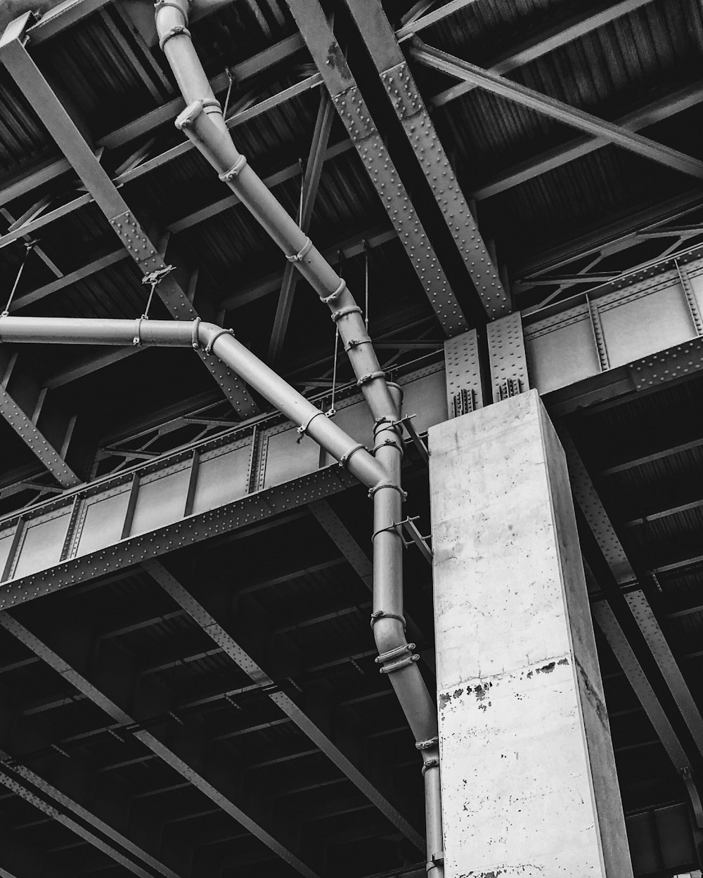 grayscale photo of building post