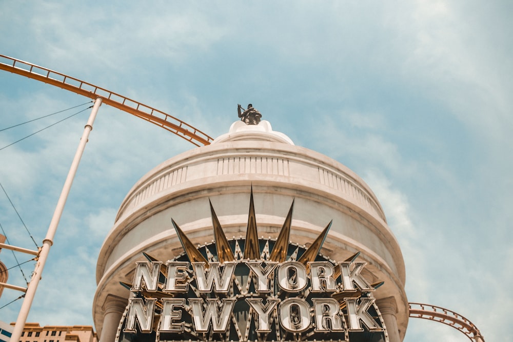 white New York signage at daytime