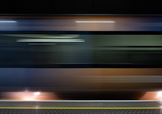 a blurry photo of a train passing by