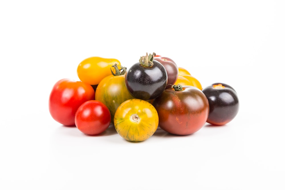 round fruits on white surface