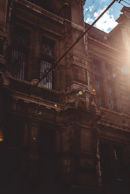 A cinematic shot of Pendleton Chapel Seminary’s grand entrance bathed in golden light with subtle lens flare effects.