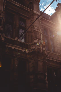 A cinematic shot of Pendleton Chapel Seminary’s grand entrance bathed in golden light with subtle lens flare effects.