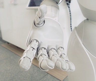 closeup photo of white robot arm