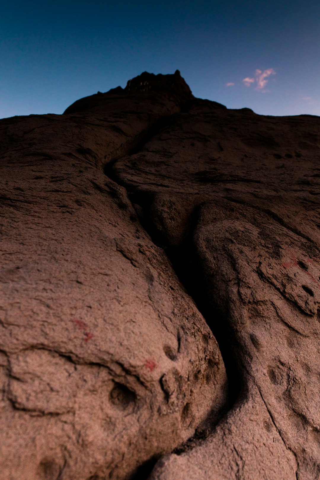 brown mountain under blue sky