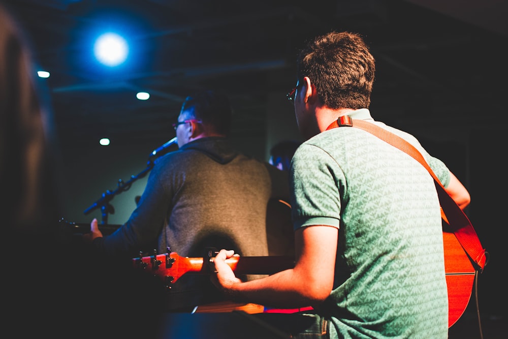 man playing guitar