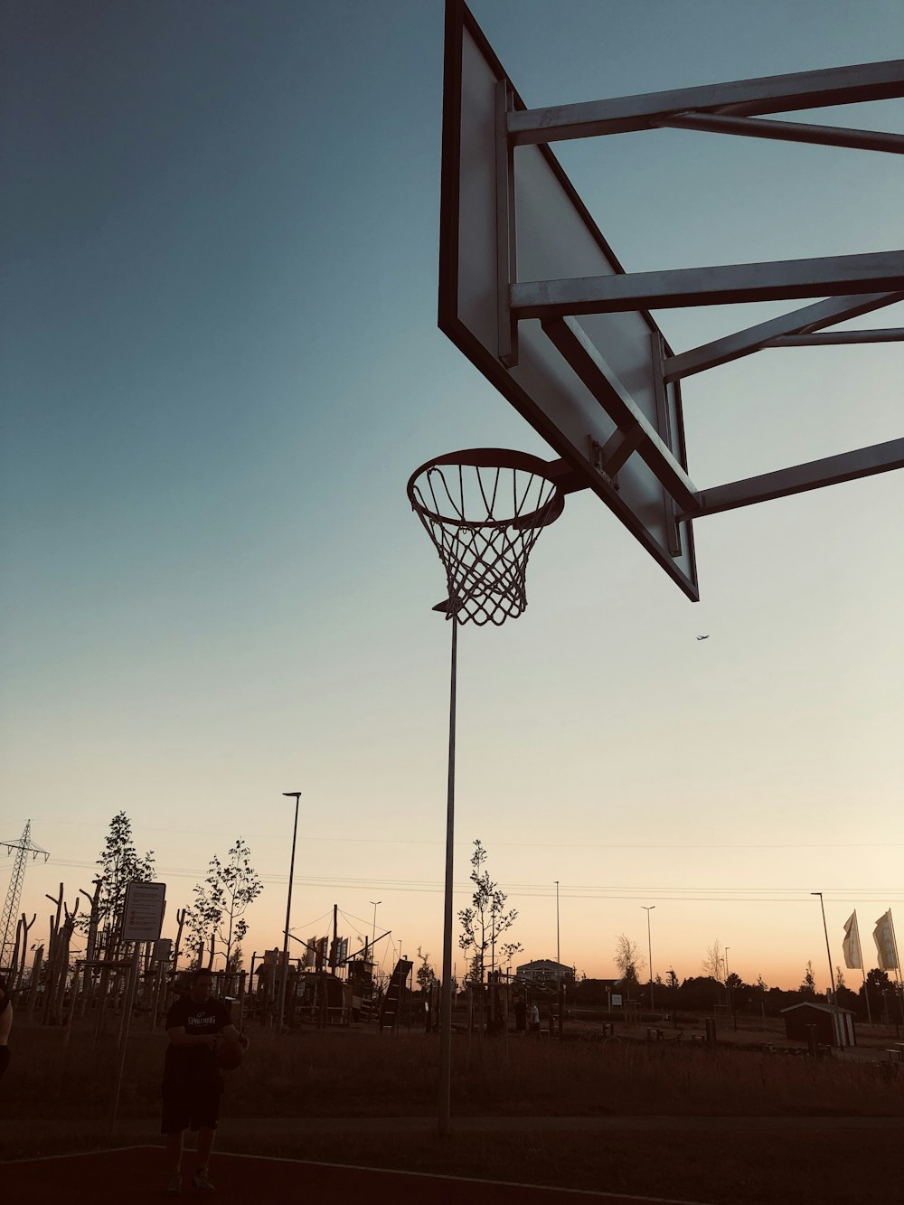 basketball court during sunset