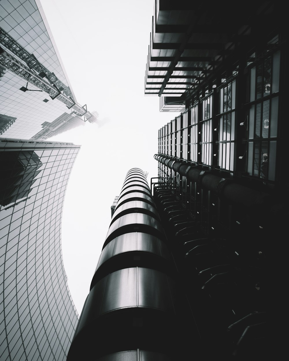 low-angle photography of skycraper buildings