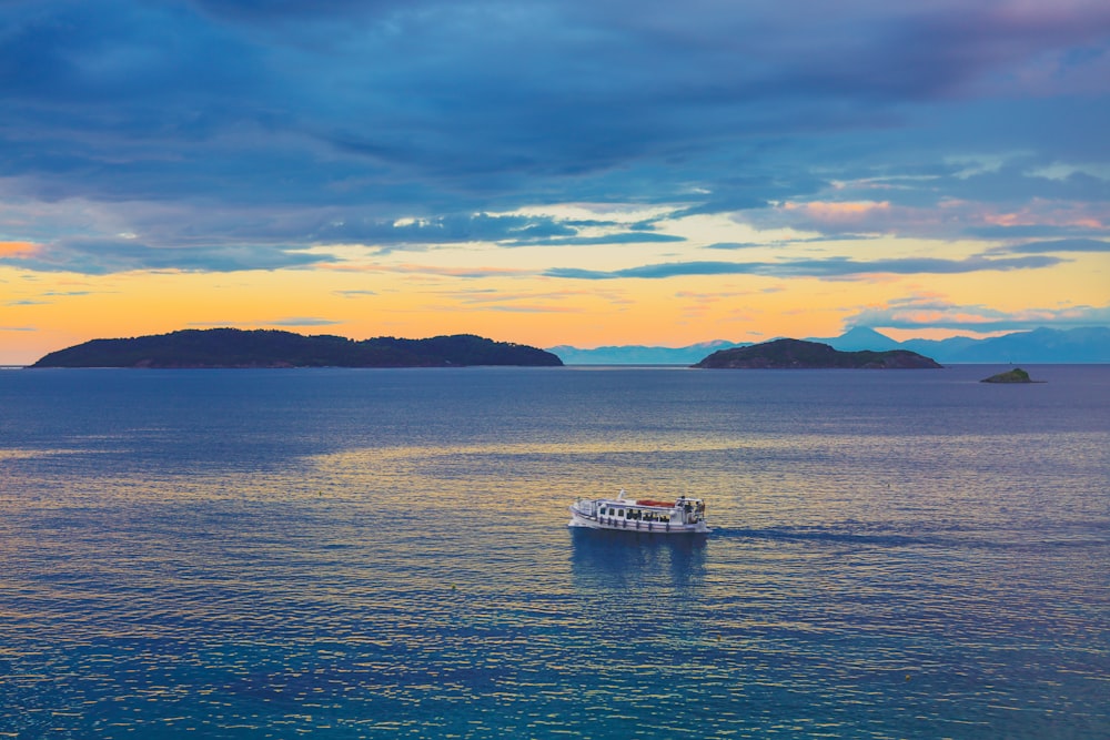 time lapse photography of boat on water