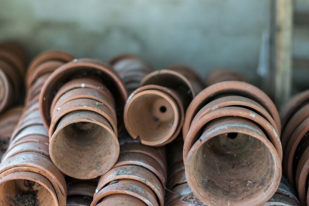 shallow focus photography of brown plant pot lot