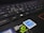 Close-up of a laptop keyboard showing several keys including Ctrl, Shift, and Fn. Near the keyboard are stickers such as NVIDIA GeForce GTX and Energy Star, indicating hardware specifications and energy efficiency.
