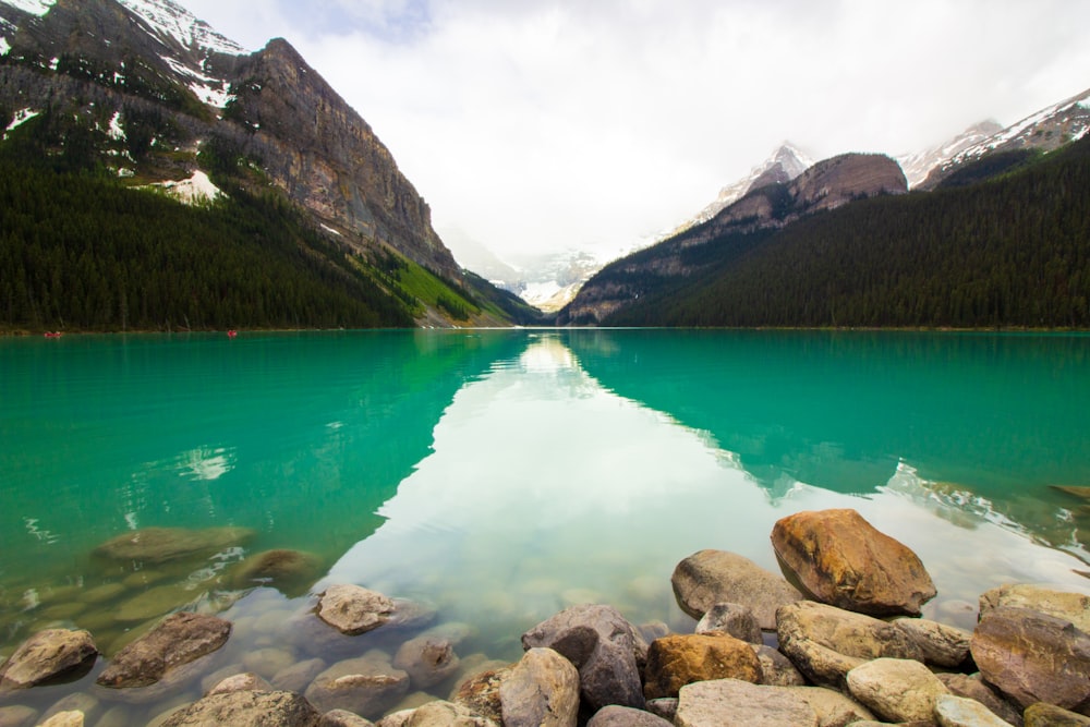 landscape photography of lake and mountains