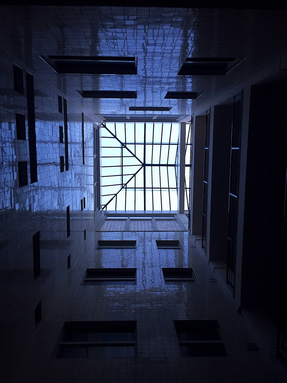low-angle photography of white interior building