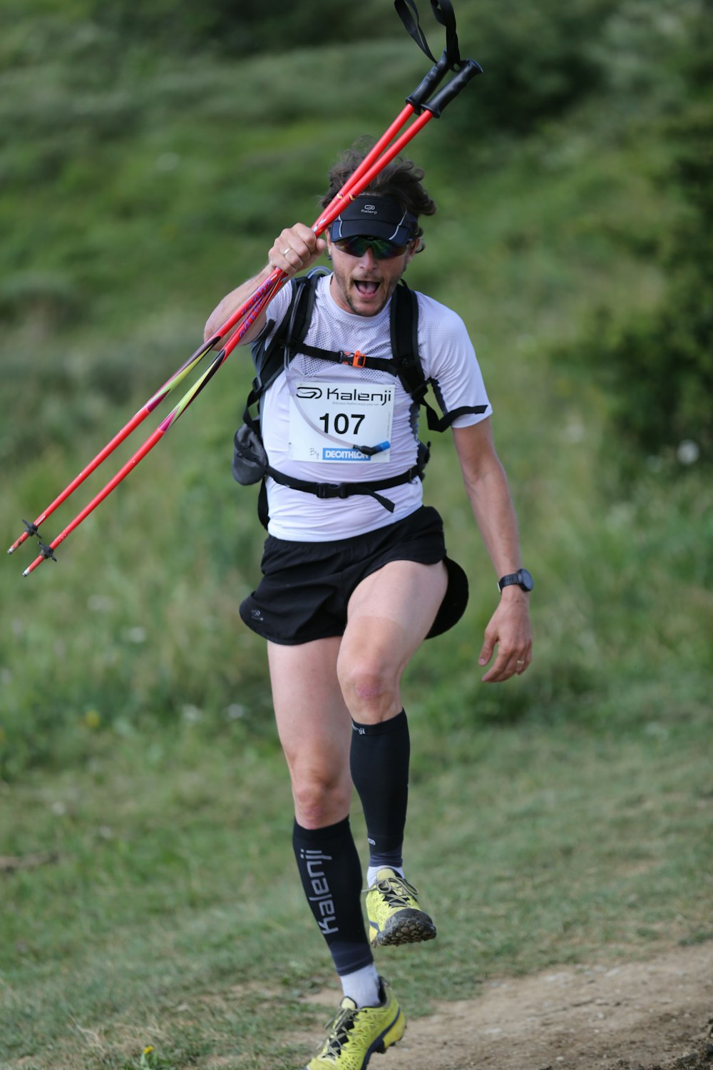 man holding ski poles