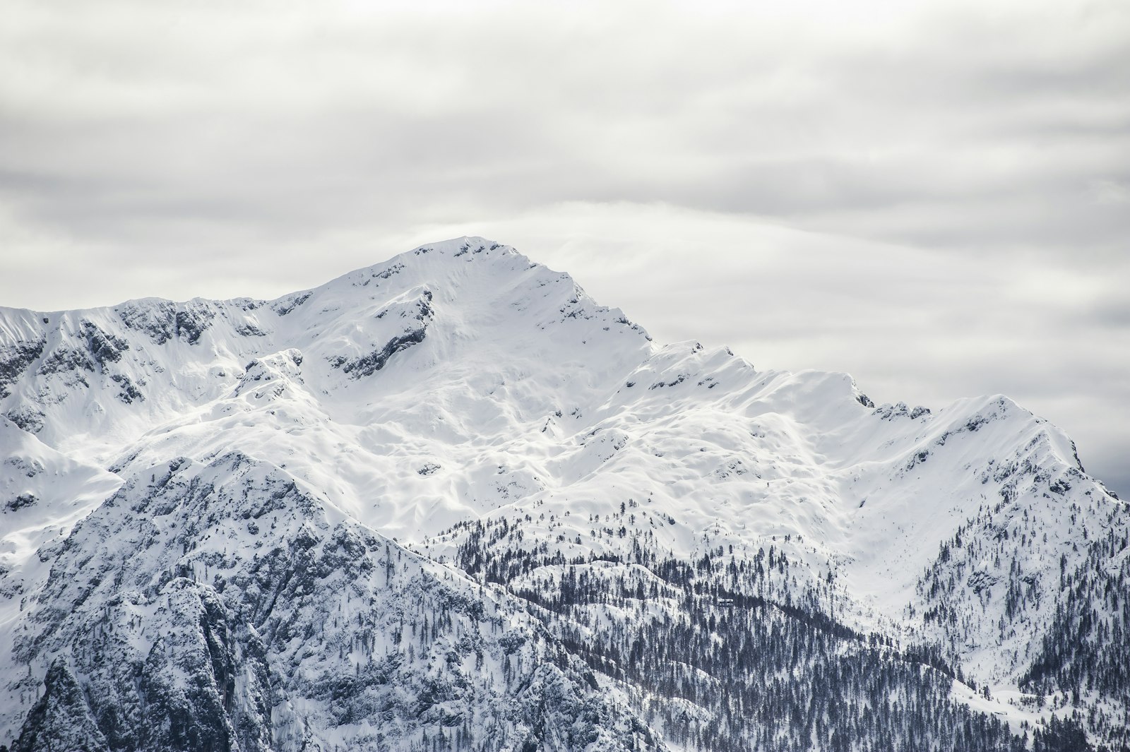 Nikon D700 + Nikon AF-S Nikkor 70-300mm F4.5-5.6G VR sample photo. Snow mountain under cloudy photography