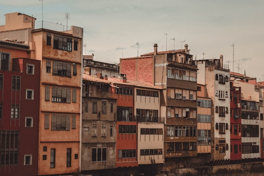 lined up concrete buildings in Girona Spain