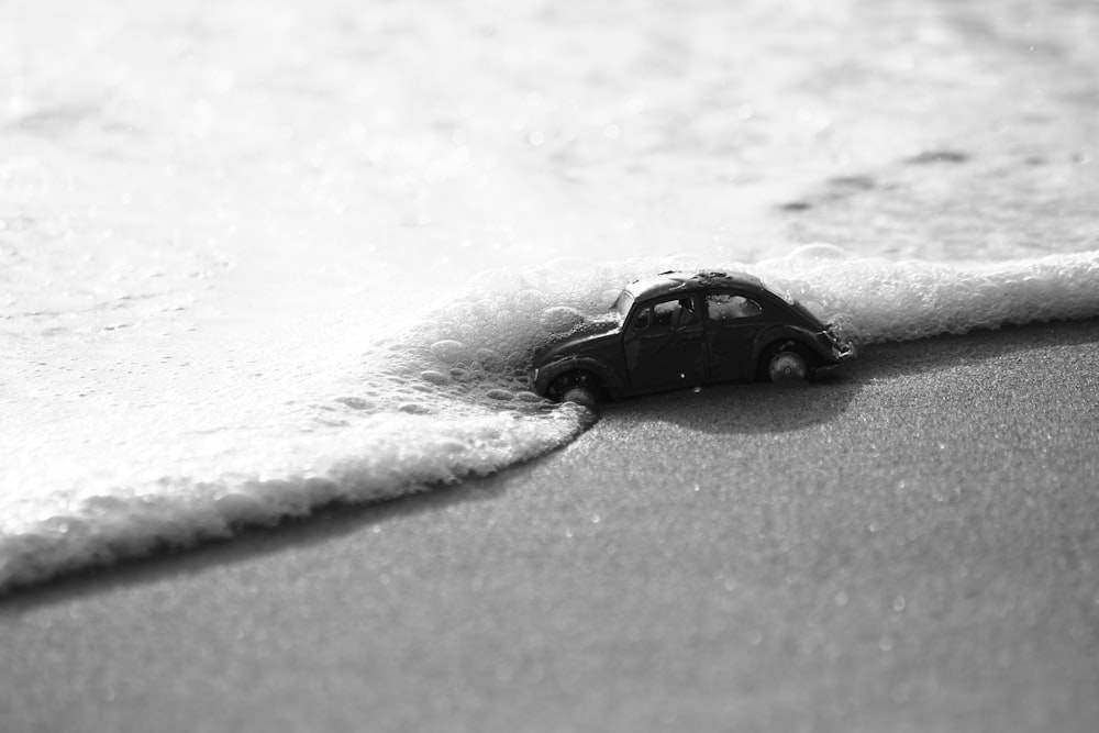 grayscale photo of Volkswagen beetle