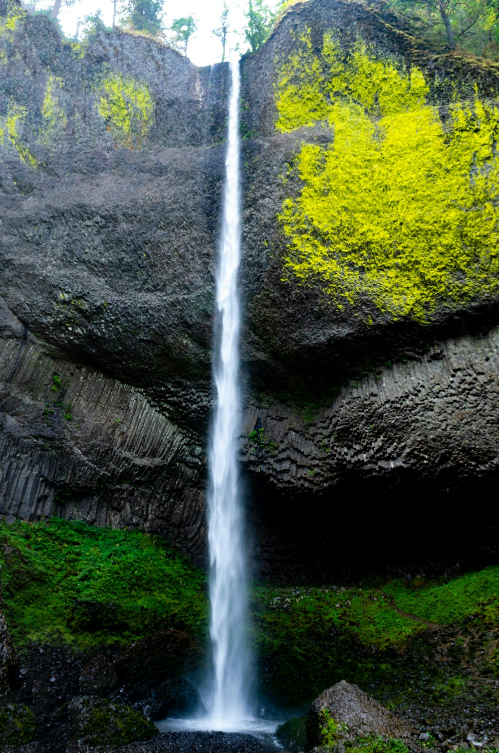 time lapse photography of waterfall