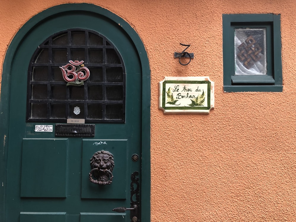 green door with black frame