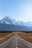 mountains covered with snow near road