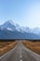 mountains covered with snow near road
