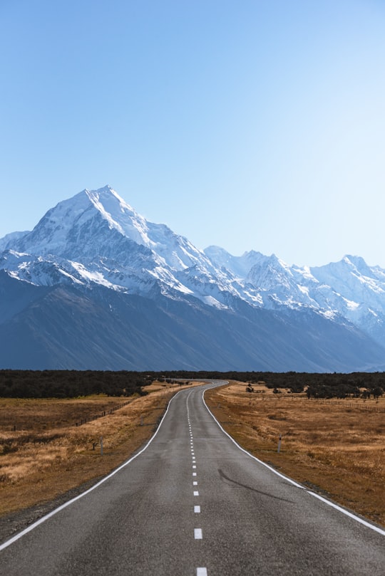 mountains covered with snow near road in Lake Pukaki New Zealand