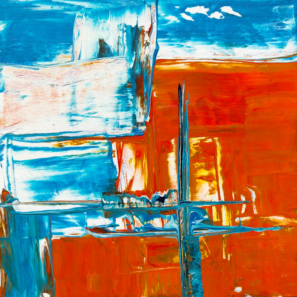 Person Showing Blue And Red Abstract Painting Photo Free