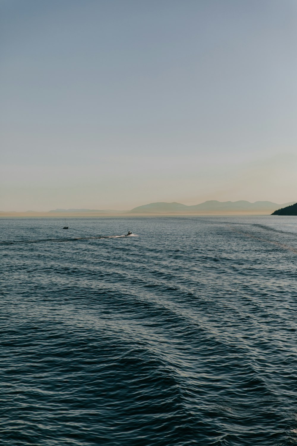 person riding personal watercraft in sea