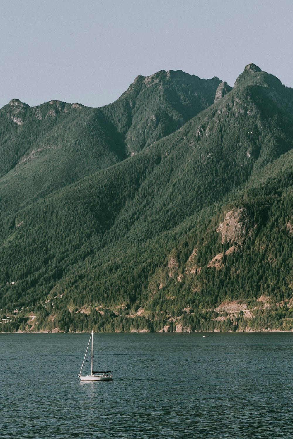 boat on lake near mountain