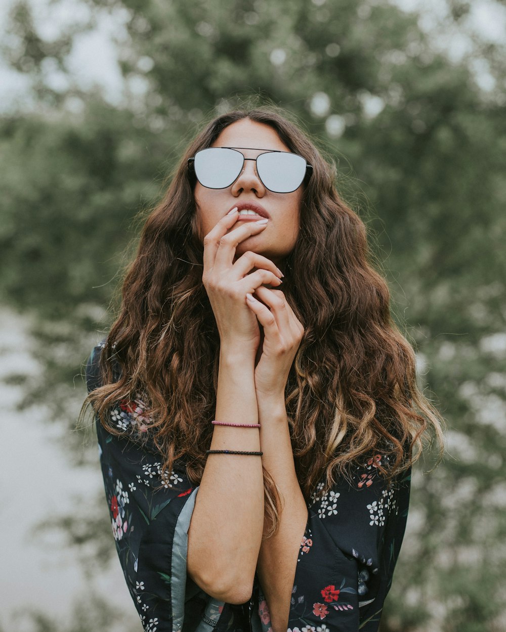 portrait photo of woman wearing sunglasses