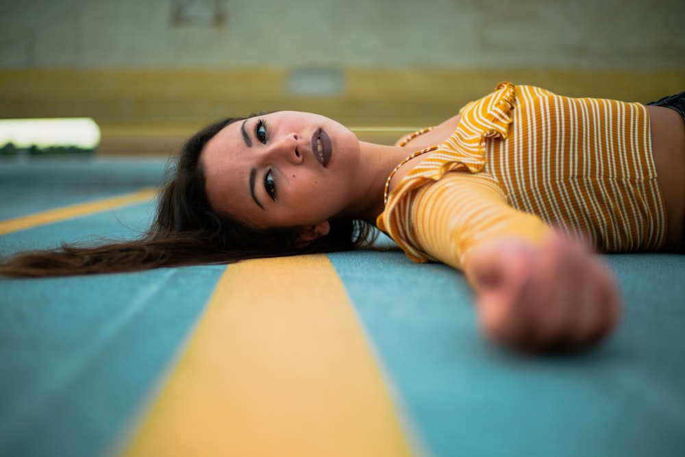 woman lying on ground