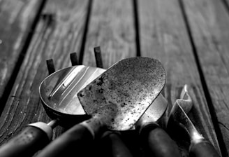 greyscale photo of gardening tools