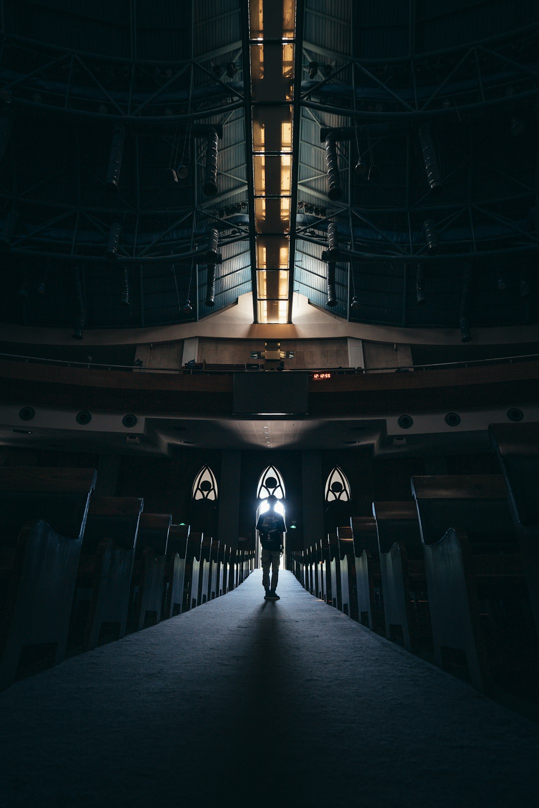 man standing in the middle of church