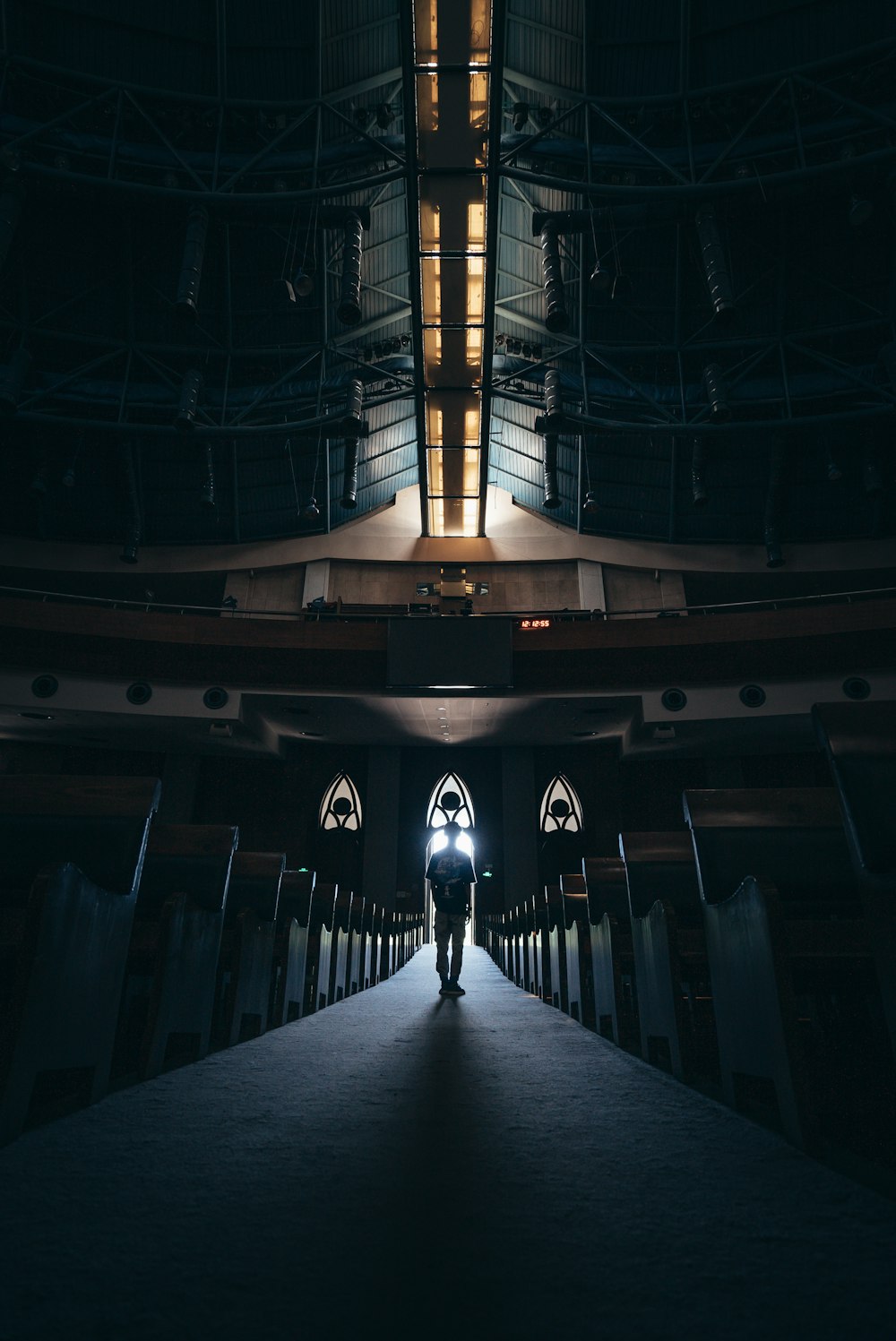 man standing in the middle of church