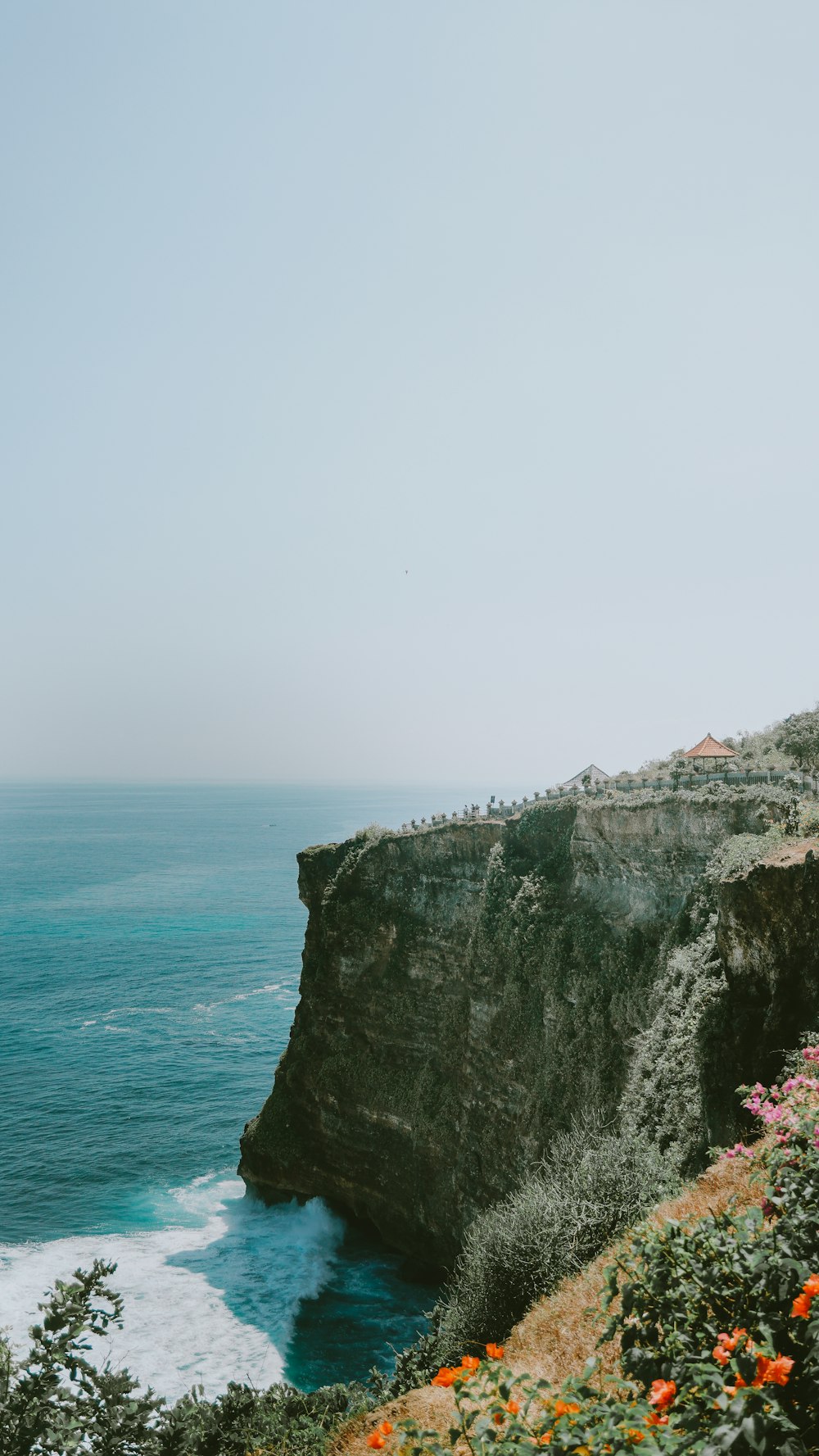 a view of the ocean from a cliff