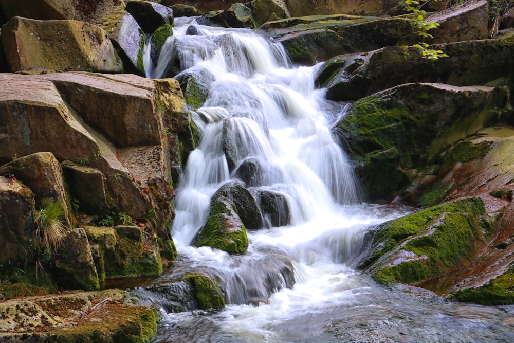 time lapse photo of waterfalls