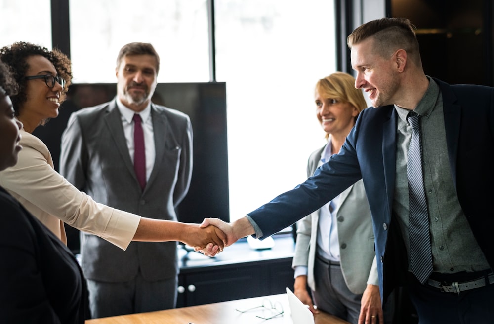 people standing inside office