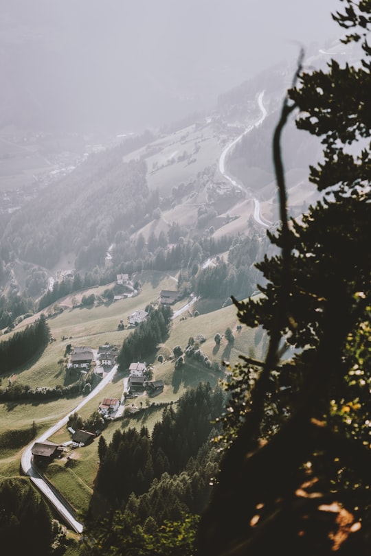 aerial photography of mountain town and road in Ahornach Italy