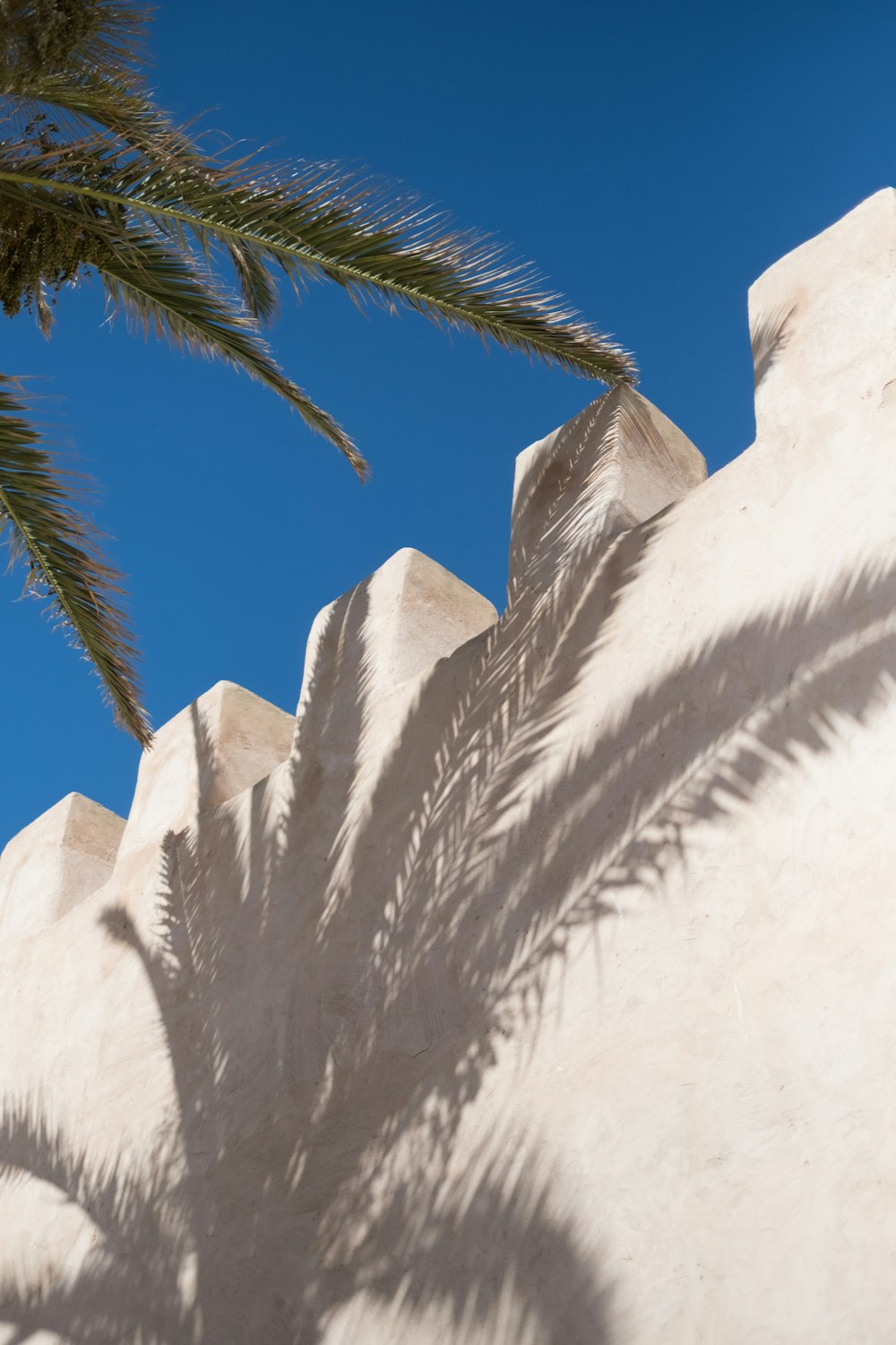 white concrete wall during daytime