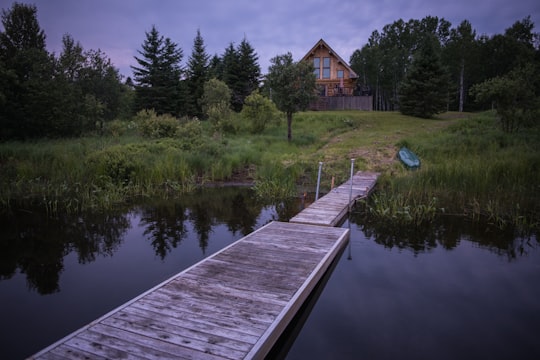 gray dock during daytime in Sainte-Anne-du-Lac Canada