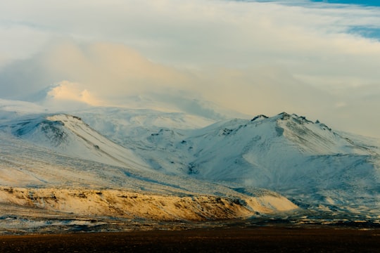 snow-covered mountains during cloudy day in Snæfellsjökull Iceland
