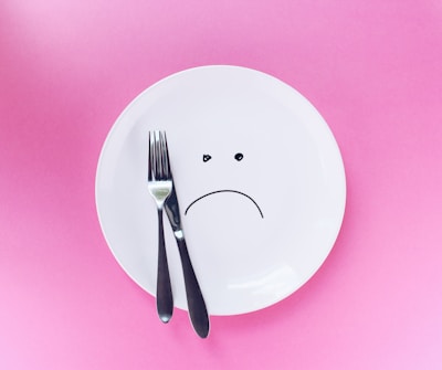 silver fork and knife on plate